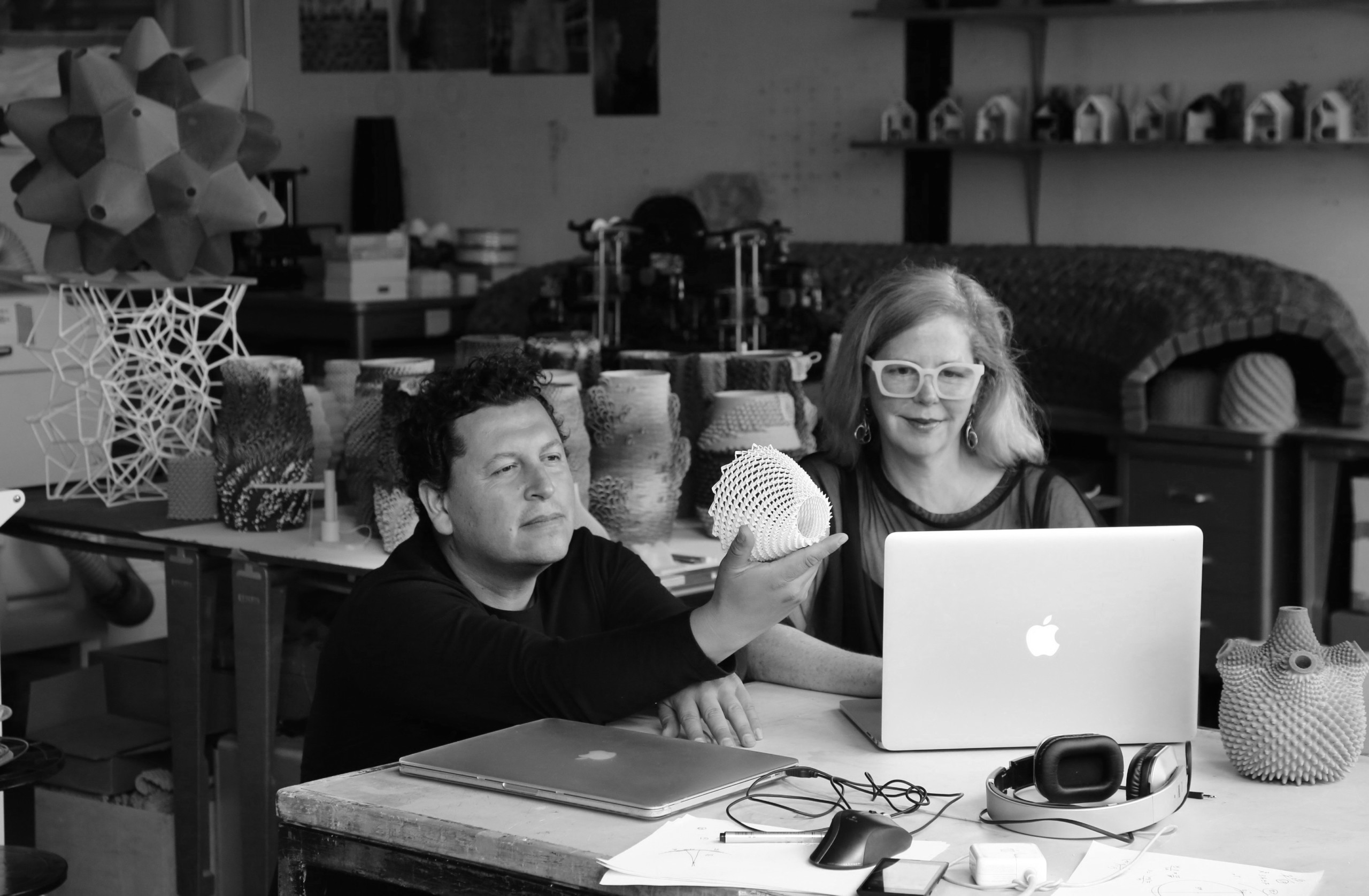 Black and white portrait of artists Virginia San Fratello and Ron Rail