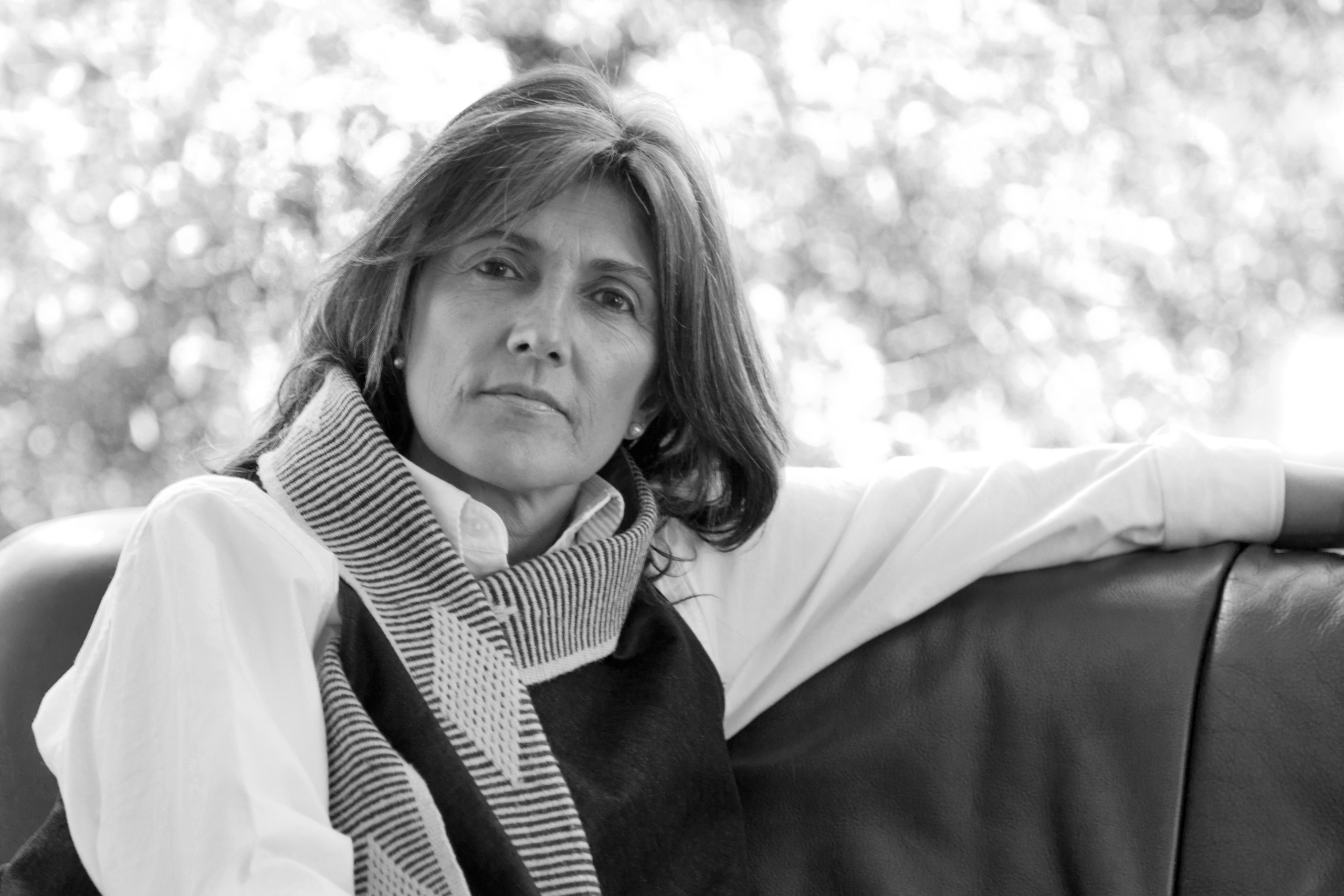 Black and white portrait of artist Alexandra Agudelo